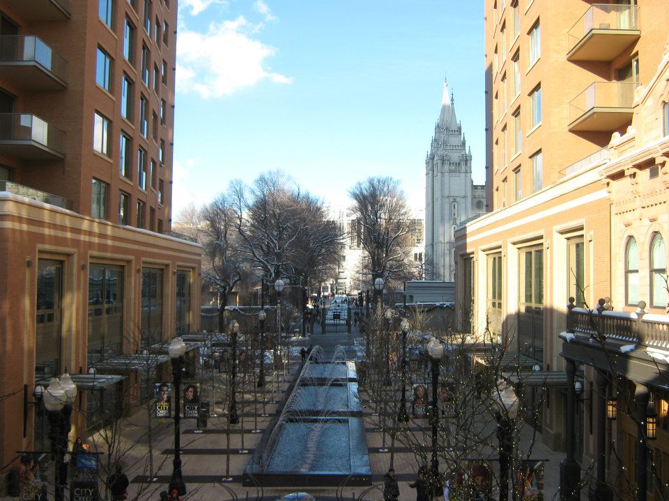 View of City Creek Center mixed-use development from above with the Salt Lake Temple visible directly adjacent to the north.