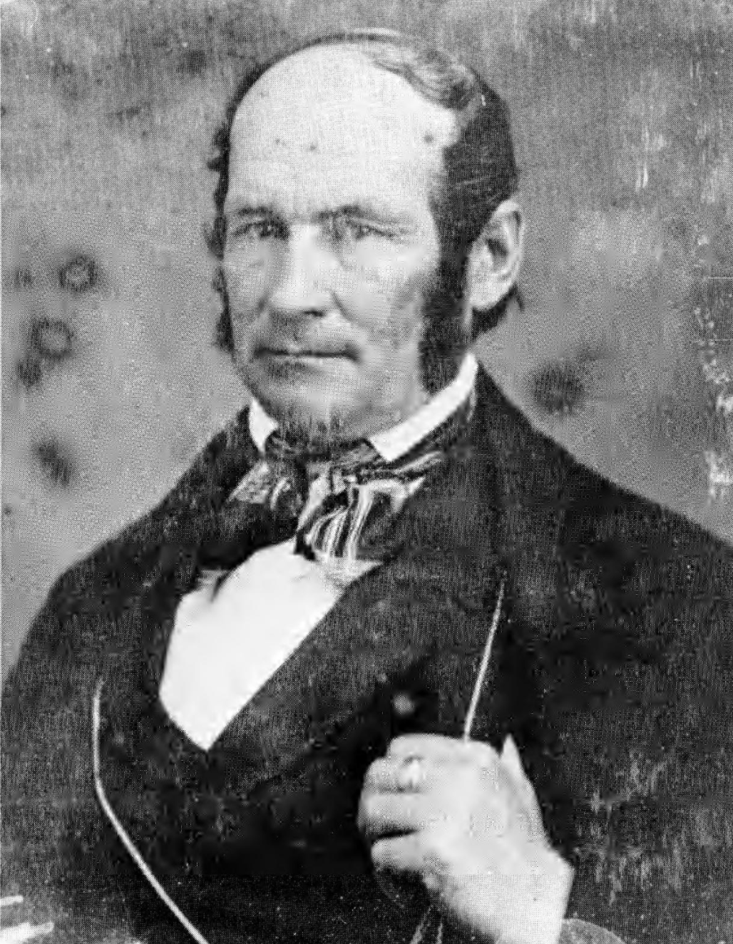 Black-and-white nineteenth-century portrait of Heber C. Kimball — an early Latter-day Saint apostle and Master Mason — shown in formal period dress with white shirt collar and dark coat.