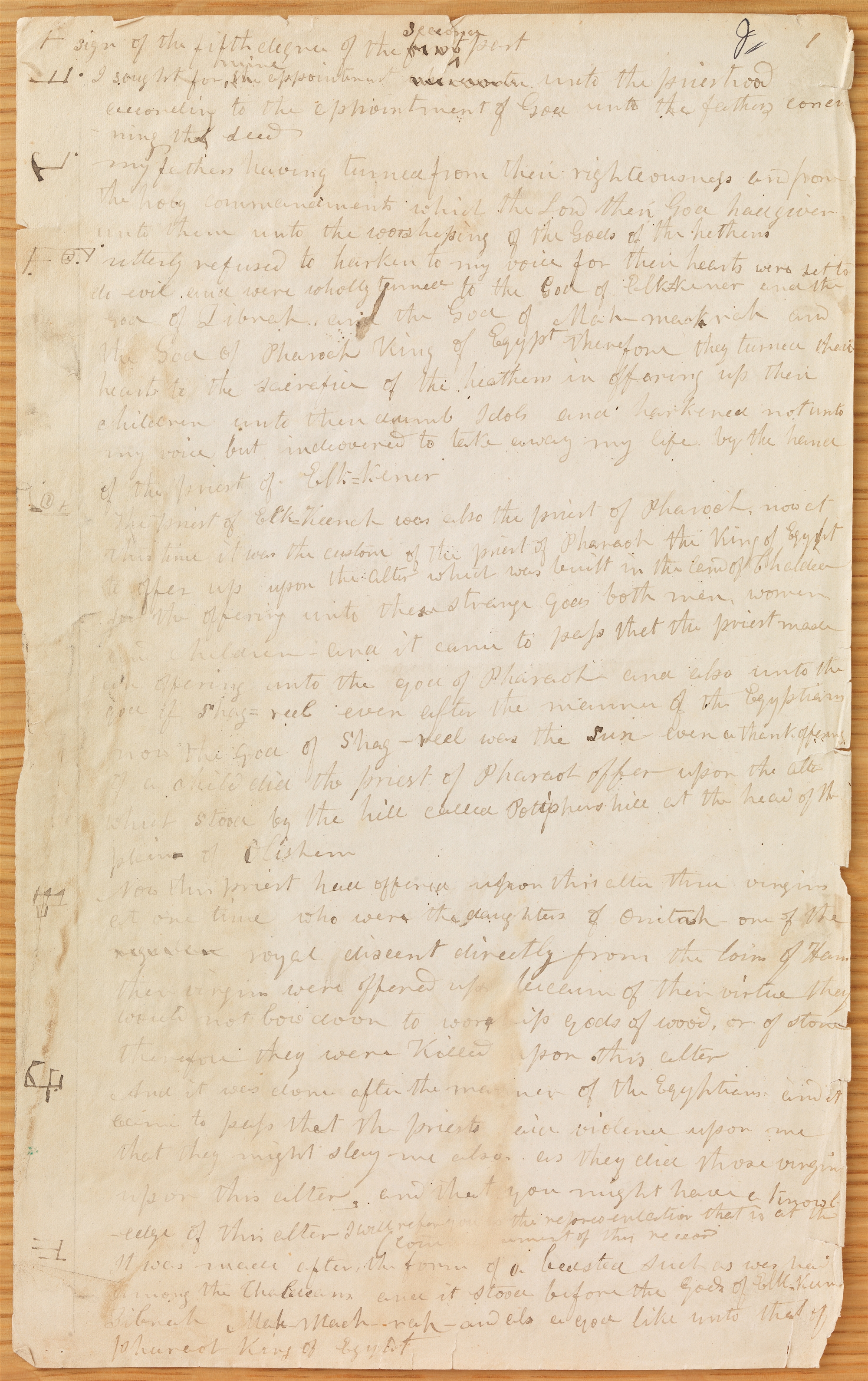 Photograph of page 1 of Book of Abraham Manuscript A (Abraham 1:4–2:6) in the handwriting of Frederick G. Williams, circa July–November 1835, with hieratic characters in the left margin. From the Joseph Smith Papers, Volume 4.
