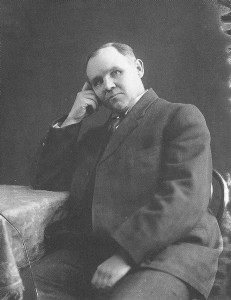 Studio portrait of James E. Talmage by photographer Charles Ellis Johnson, 1912. Talmage held a PhD in geology and served as an Apostle from 1911 until his death in 1933; he delivered 'The Earth and Man' from the Tabernacle pulpit on 9 August 1931 at the First Presidency's invitation.